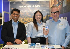 Sergio Castro, Alisa Munoz, and Gerd Uitdewilligen with Copeland proudly show the company’s new GO Real-Time tracker.